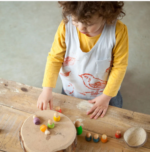 Light Baby Nins Play Set – 6 Wooden Figures & Coconut Shell